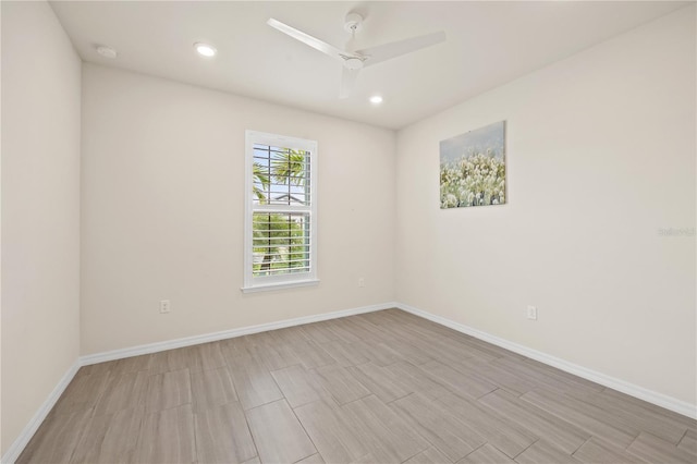 unfurnished room with ceiling fan