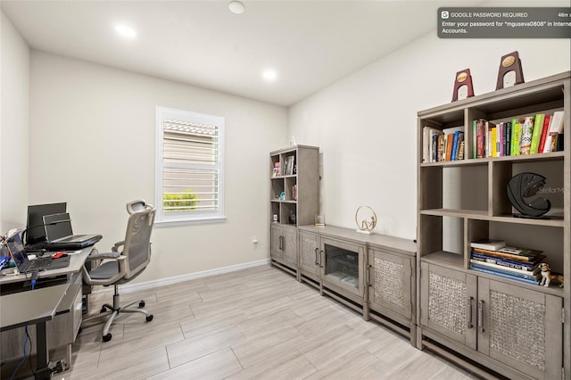 office space with light wood-type flooring