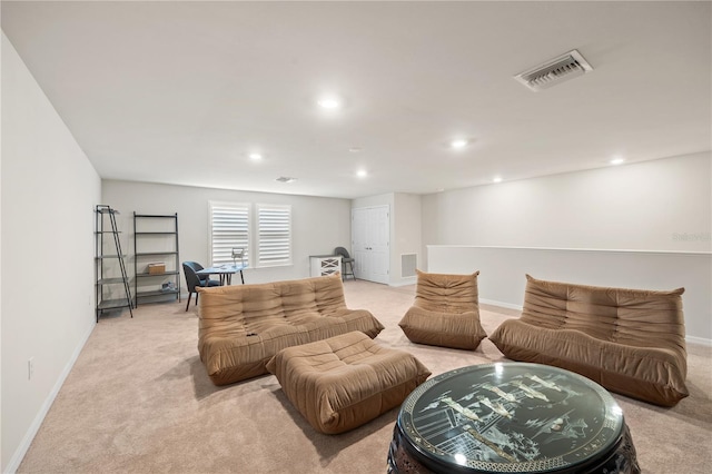 living room featuring light carpet