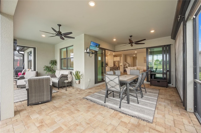 dining space with ceiling fan