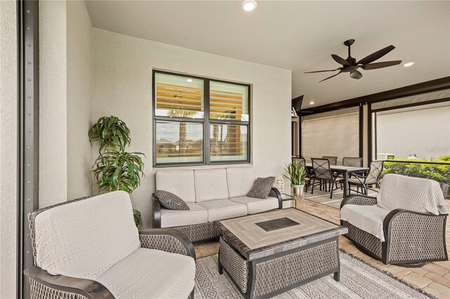 view of patio / terrace featuring outdoor lounge area and ceiling fan