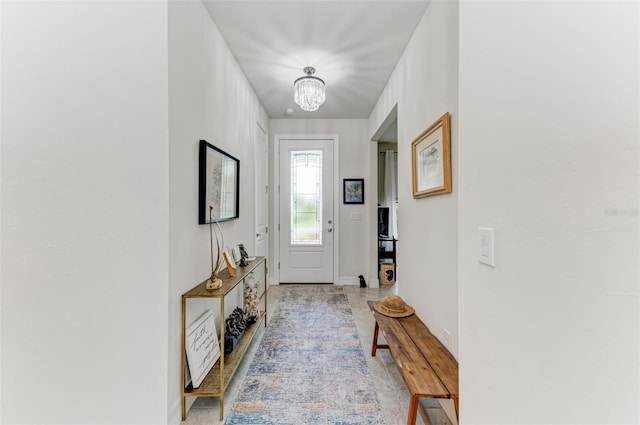 entrance foyer featuring a chandelier