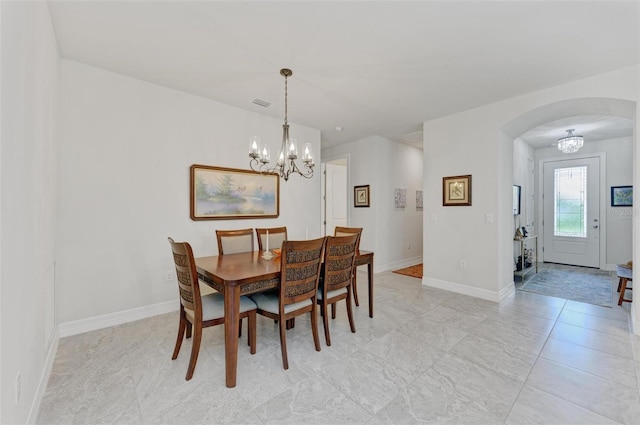 dining room with an inviting chandelier