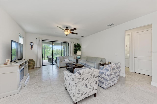 living room featuring ceiling fan