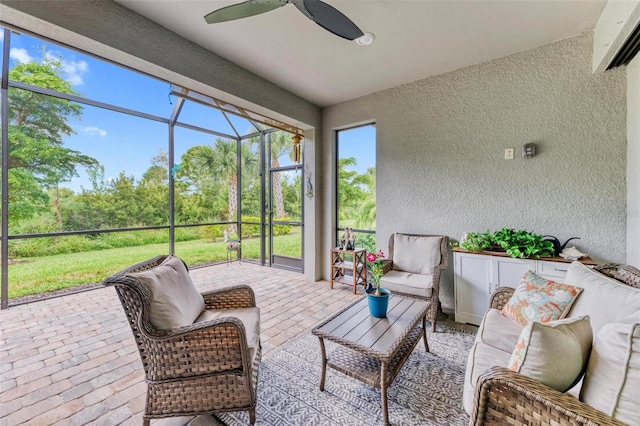 sunroom / solarium with ceiling fan