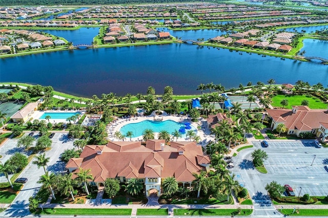 bird's eye view with a water view