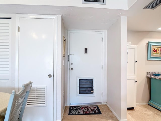 618 Bird Bay Dr S Unit 202, Venice, FL 34285 - interior space with baseboards and visible vents