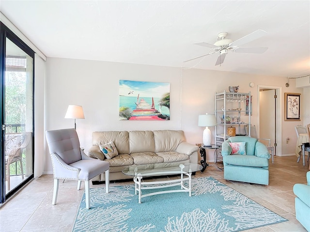 618 Bird Bay Dr S Unit 202, Venice, FL 34285 - living area featuring baseboards and ceiling fan