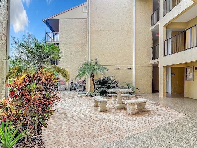 view of patio / terrace featuring a balcony