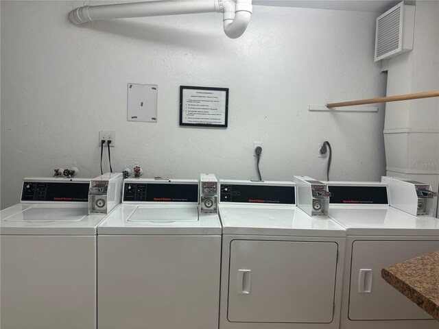 618 Bird Bay Dr S Unit 202, Venice, FL 34285 - shared laundry area with washing machine and dryer