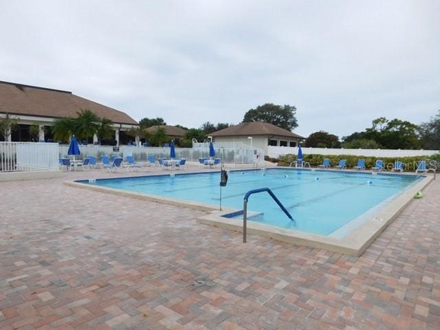 618 Bird Bay Dr S Unit 202, Venice, FL 34285 - pool with fence and a patio area