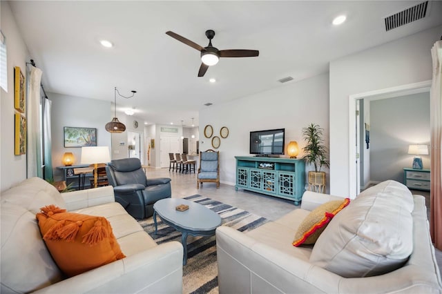 living room with ceiling fan