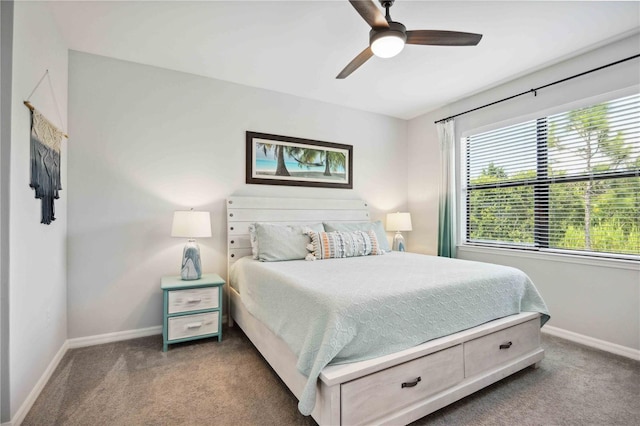 bedroom with ceiling fan and carpet floors