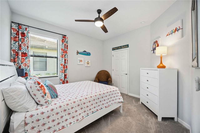 bedroom featuring ceiling fan and carpet flooring