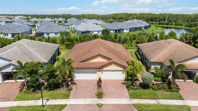 bird's eye view with a water view