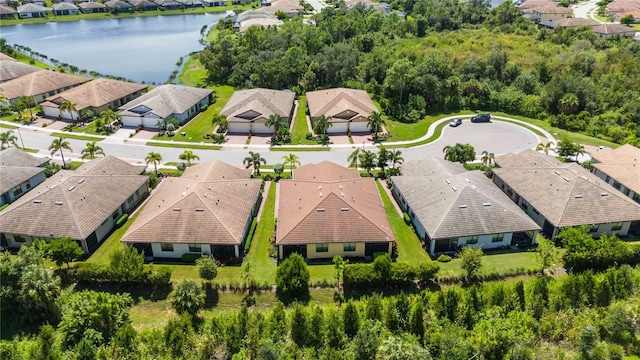 drone / aerial view with a water view