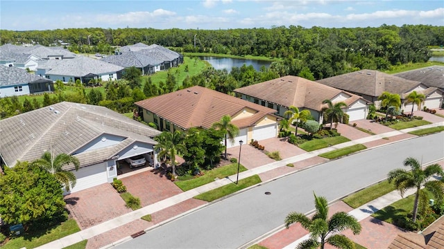 drone / aerial view with a water view