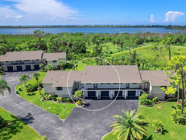 birds eye view of property featuring a water view