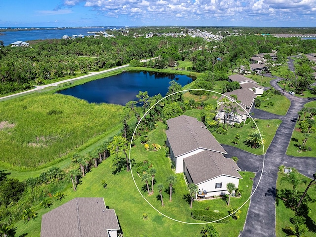 birds eye view of property featuring a water view