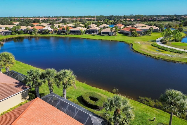 aerial view with a water view and a residential view