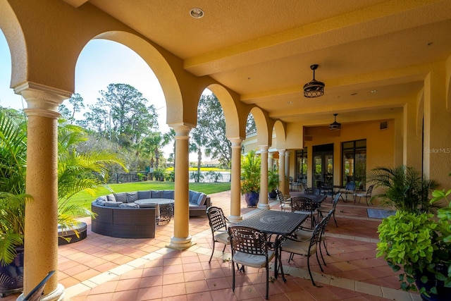 view of patio with french doors and an outdoor living space