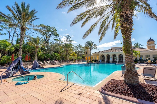 pool with a patio area