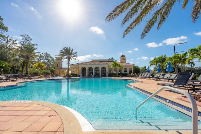 view of swimming pool featuring a patio area