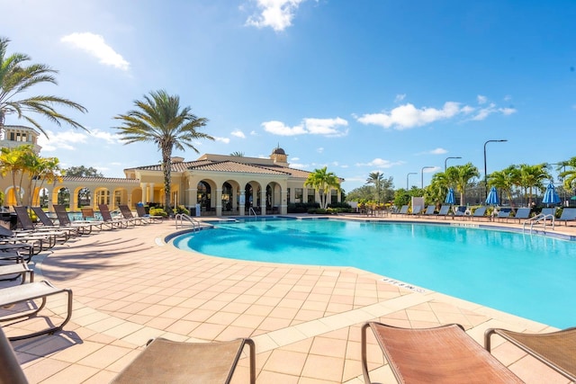 pool featuring a patio area