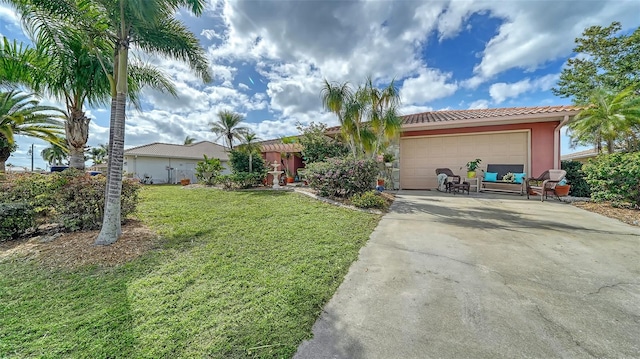 ranch-style house with a front yard and a garage