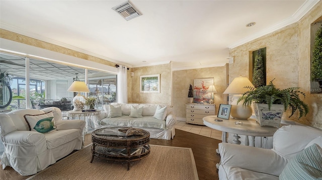 living room featuring crown molding