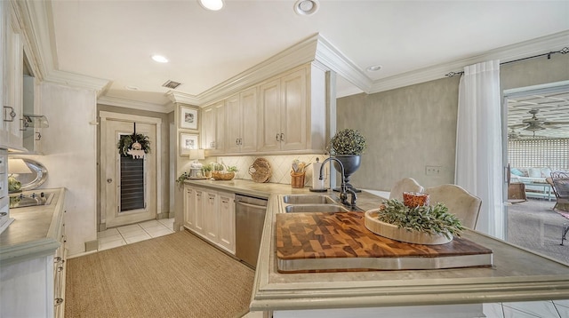 kitchen with sink, backsplash, stainless steel dishwasher, crown molding, and light tile patterned floors