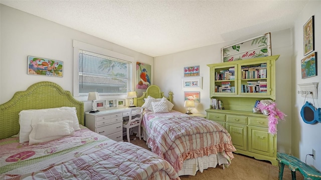 carpeted bedroom with a textured ceiling