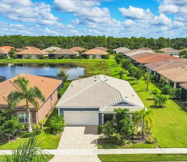 drone / aerial view with a water view