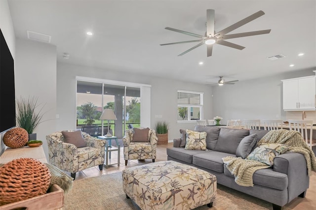 living room featuring ceiling fan