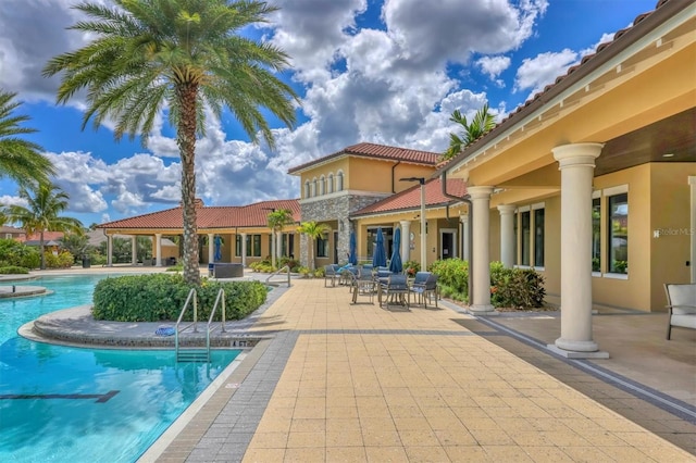 view of pool with a patio