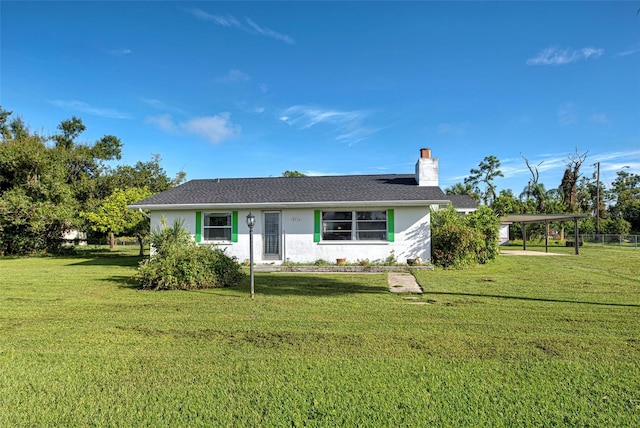 ranch-style home with a front yard