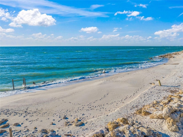 property view of water featuring a beach view