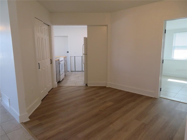 hallway featuring light hardwood / wood-style flooring