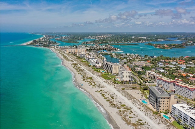 drone / aerial view with a view of the beach and a water view