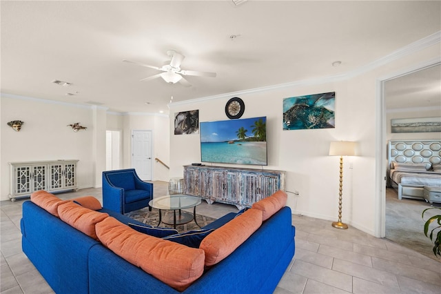 living room featuring light tile patterned flooring, ornamental molding, and ceiling fan