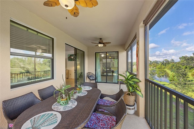 sunroom / solarium with ceiling fan