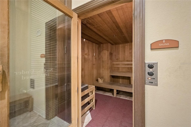 view of sauna / steam room featuring wood ceiling