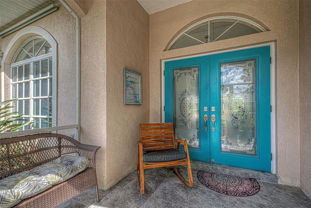 doorway to property featuring french doors