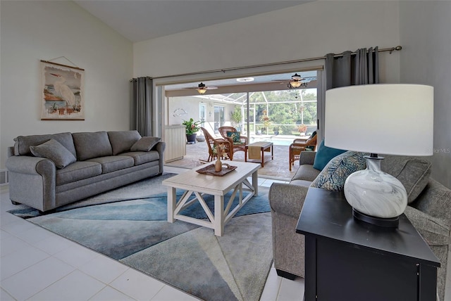 tiled living room with ceiling fan