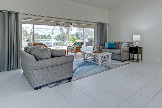 tiled living room featuring a healthy amount of sunlight