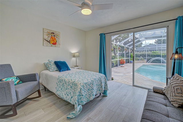 bedroom featuring light hardwood / wood-style flooring, access to exterior, and ceiling fan