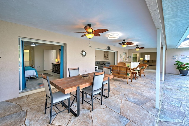 dining room with ceiling fan