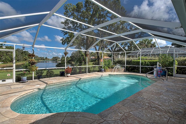 view of swimming pool with a patio area, a water view, and a lanai