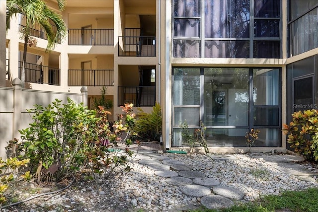 entrance to property featuring a balcony