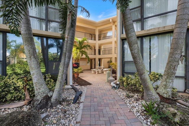 view of community with a patio